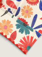 Playful Floral Print Embroidered Trim Bikini Top